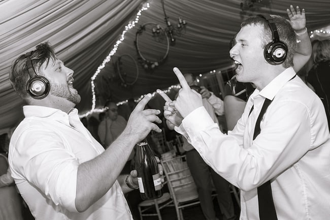 Silent disco wedding hire with LED headphones over 3 channels of music